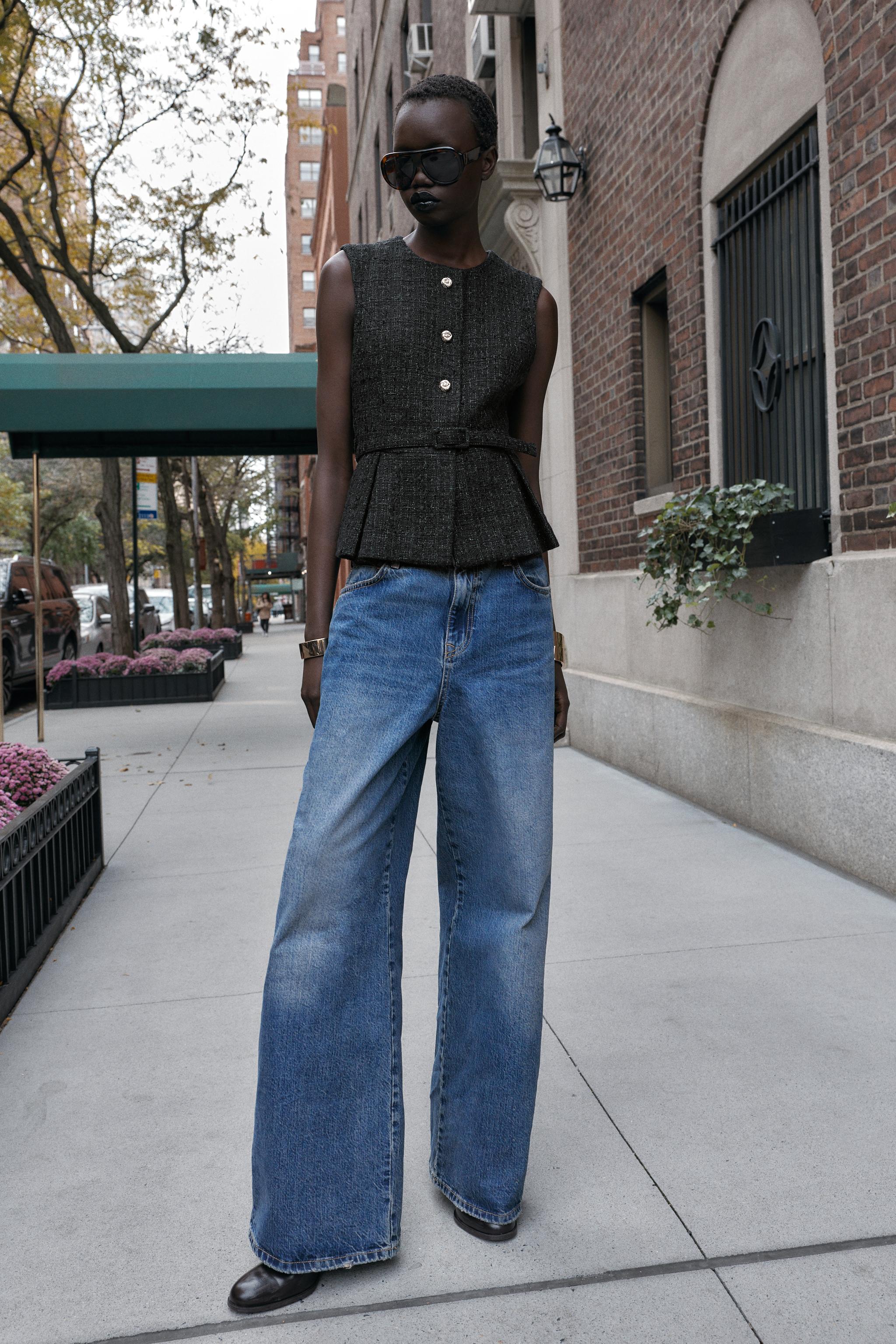 GILET STRUCTURÉ AVEC CEINTURE ET FIL MÉTALLISÉ